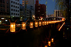 Candles were lined up high and low.