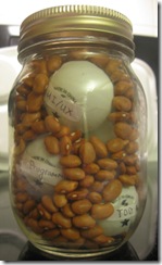  Jar filled with ping-pong balls and kidney beans