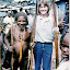 Native elder posing with Jan at Tembagapura Native elder posing with Jan at Tembagapura