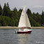 Evan sails Whisper in light air