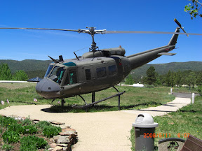 Bell UH-1 Iroquois aircraft that saw extensive action in Vietnam. This HUEY was given to the Memorial by the New Mexico Army National Guard.