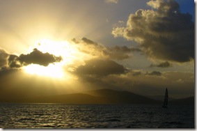 Speaking of majestic sights, how about this sailboat sailing out of the sunset?  (click to enlarge)
