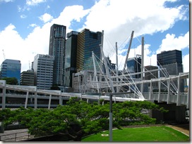 A funky pedestrian bridge across the river to a very modern business district (click to enlarge)