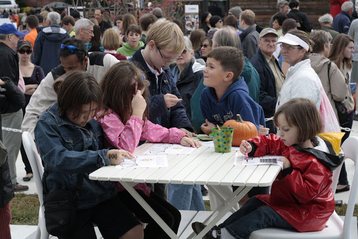 We made sure the kids in line were happy too, and had crayons and Simple Solar coloring sheets out on our porch.  Everyone loved them!
