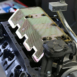 The windage tray goes on. We had to machine these holes to fit. It seems that everything needs customization.