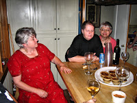 Wanda, Bucky, & Mree enjoy a late glass around the kitchen island