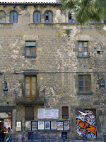 Date: May 2006</p>
<p>Location: Barcelona</p>
<p>Story: Not much to tell. At the foot of the Rambla stood this building, a youth hostel of sorts. Busy place in spite of the disrepair. I did not go inside to see what state the building was in. Barcelona renovates a lot of the old building, maintaining the facade, while erecting an new inside. An technique that has been perfected in Montreal.