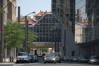 Date: July 2010
Location: Montreal

 How many different fabrics can you get in one picture. Reflecting windows, old structures, Chinese pavilions, tunnels, cars, it is all there.