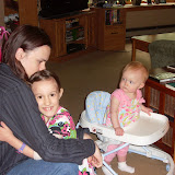 Monica hugs Liam.  Cassidy wants a hug, too!