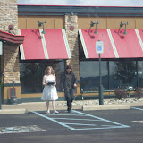 Leaving the restaurant after their date.