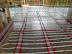 Radiant floor will be heated with geothermal refrigerant that will transmit the heat from refrigerant to water. The heated water will travel about 300 feet before looping back the cooled off liquid.
MVG