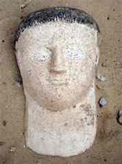 A handout photo released by Egypt's Supreme Council of Antiquities shows a gypsum mask unearthed alongside a sarcophagus recently discovered in Bahariya Oasis, 300 km (190 miles) southwest of Cairo April 12, 2010 A handout photo released by Egypt's Supreme Council of Antiquities shows a gypsum mask unearthed alongside a sarcophagus recently discovered in Bahariya Oasis, 300 km (190 miles) southwest of Cairo April 12, 2010