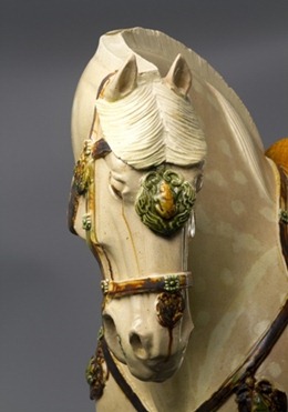 A Three-color Horse Earthenware in sancai glaze China, Tang Dynasty 618 – 907 A Three-color Horse Earthenware in sancai glaze China, Tang Dynasty 618 – 907