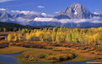 Click to view NATURE + NATURAL + 1680x1050 Wallpaper [Along the Snake River at Sunrise Below Mount Moran Grand Teton National Park Wyoming.jpg] in bigger size