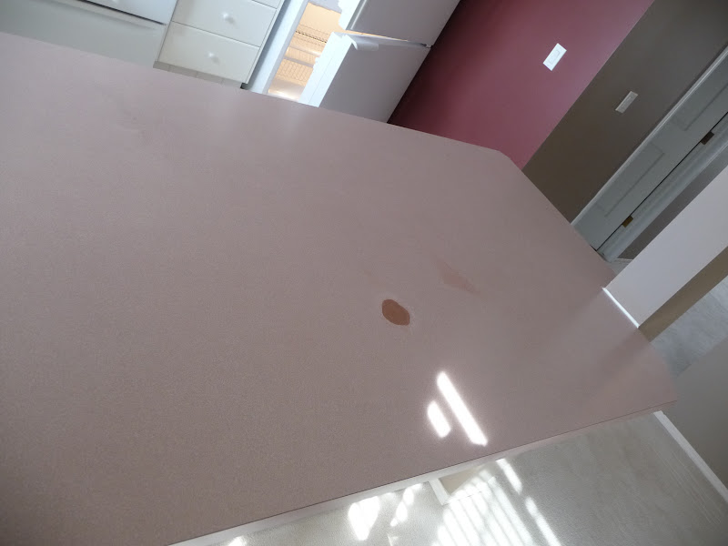 Burn mark on laminate counter top =/ Suggestions on how to fix/cover