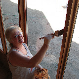Karen staining great room window 11/2