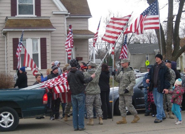 [lining the funeral procession route with 1000 flags[1].jpg]