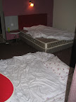 The only room we were able to get had a single bed - for 8 people (the hotel managers never knew we took it for 8)