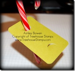 Putting candy cane in