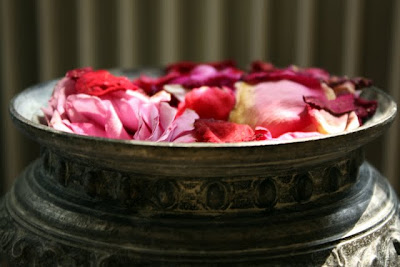 Bowl of rose petals at Chateau St Julien l'Ars near Poitiers France