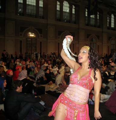 Secret Cinema performer with a snake