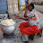 Lady making traditional meal called "Fu'Fu."