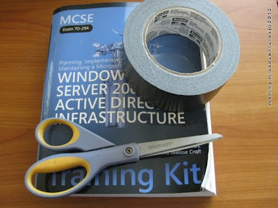 Book, duct tape, scissors