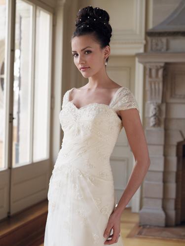 Cap sleeves are a great option for modest bridal gowns in summer