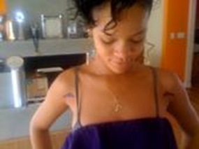 Rihanna Gun Tattoo photo