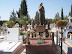 A memorial of a young girl adorned with some beautiful angel statues