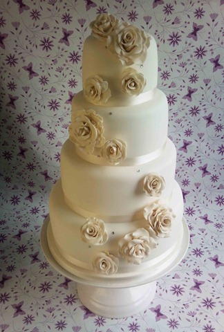 [4-tier-clean-iced-with-roses[2].jpg]