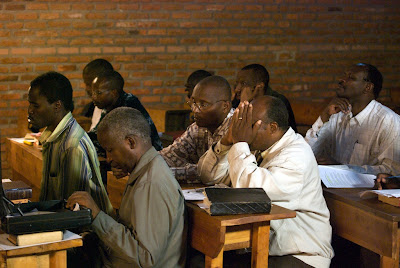 Students praying before class