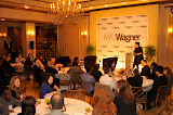 Wagner Dean Ellen Schall addressing guests at 100 Days event