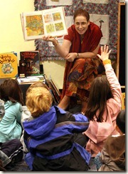 The Bridgewater school system and the Bridgewater Library have partnered amid budget cuts to promote literacy. Frist grade students from the Bradley Gardens elementary school visited the Bridgewater Library to tour the library and to have a story time session. Youth Services Librarian Carol Levin reads to the first graders. 12497 10/22/10 photo by Ed Pagliarini/MyCentralJersey