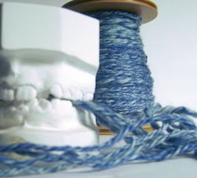 yarn and teeth blue yarn with teeth