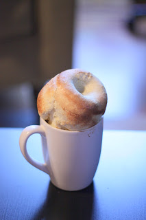 picture of popover in white coffee cup