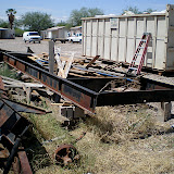 We cleared the junk away from the frame and started jacking it up.