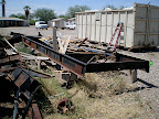 We cleared the junk away from the frame and started jacking it up.