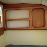 A magazine rack and bookcase in the master berth- nice touch.