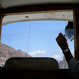The windows drop down and are pegged into position- simple but effective.