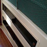 Ample storage under the salon seats.