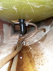 What little bilge there is under each pontoon.