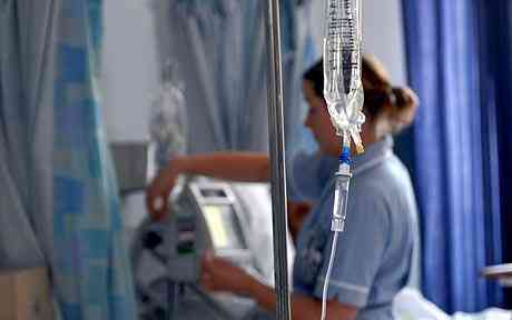 NHS should cut 30,000 beds to 