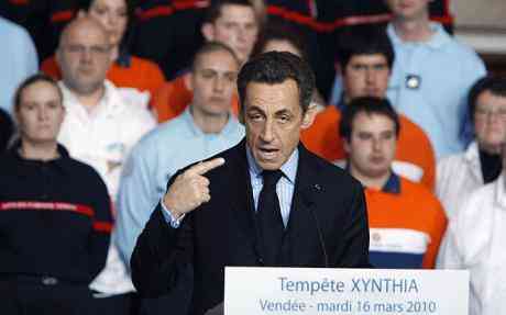 French President Sarkozy haspledged his await for Greek budding apportion George Papandreou