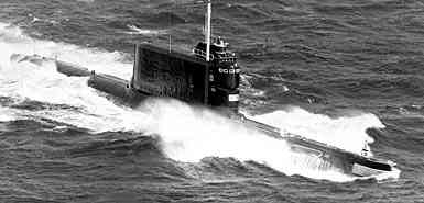 An aerial starboard crawl perspective of a Soviet Golf II category ballistic barb submarine underway. 