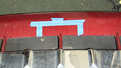 Marking the fascia for cutting to fit the optional Matrix Receiver Mount.