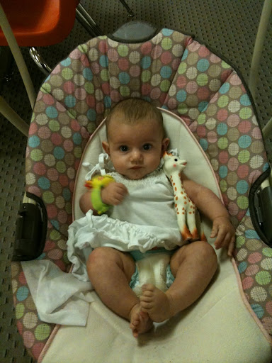 Adorable Ava hanging out with her favorite toy