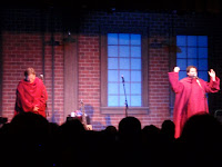 Paul and Storm dressed in those terrible wearable blankets you see advertised on late night TV.
