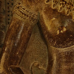 The pendents below her shoulders feature 4 segmented sections.