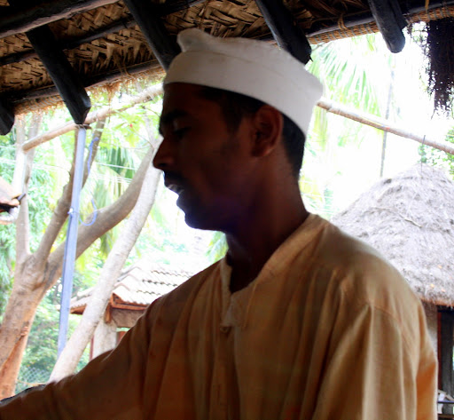 Men in Dhoti-Kurta serving Food